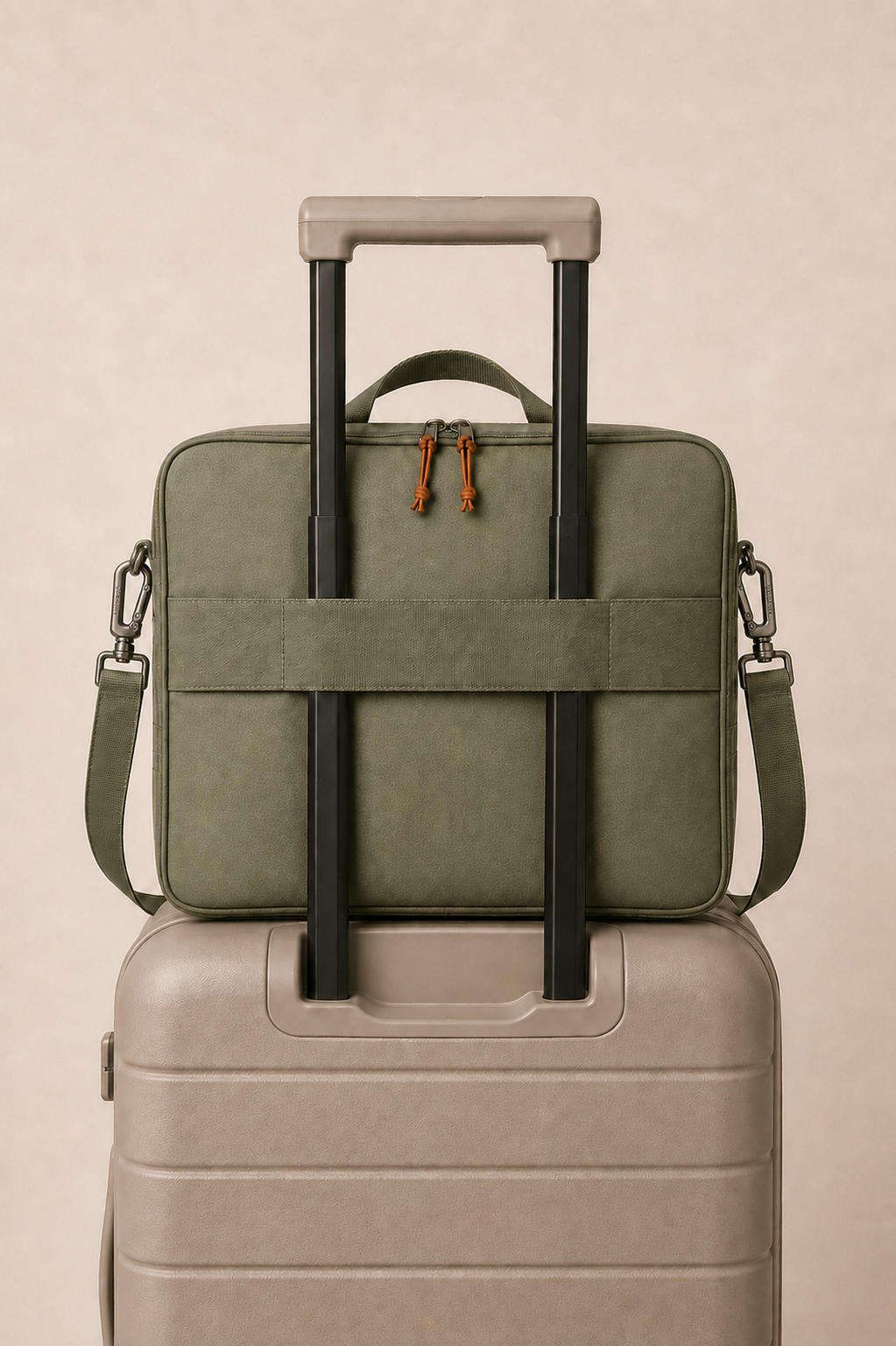 TRODDLER bag mounted on a suitcase trolley handle via the back sleeve