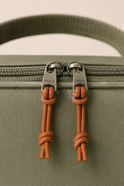 Knotted leather zip pulls — detail